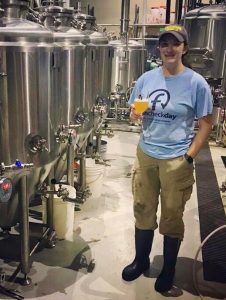 Beth Vita among the beer and cider tanks at B.C. Brewery in Hunt Valley, MD
